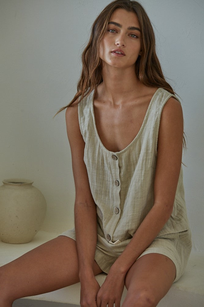 RUNNING LATE SLEEVELESS TOP
