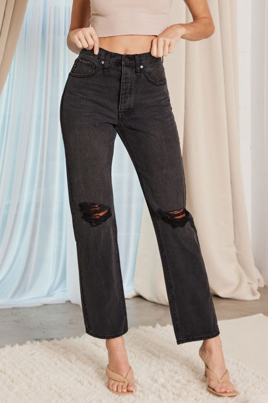 black rigid high rise distressed denim jeans